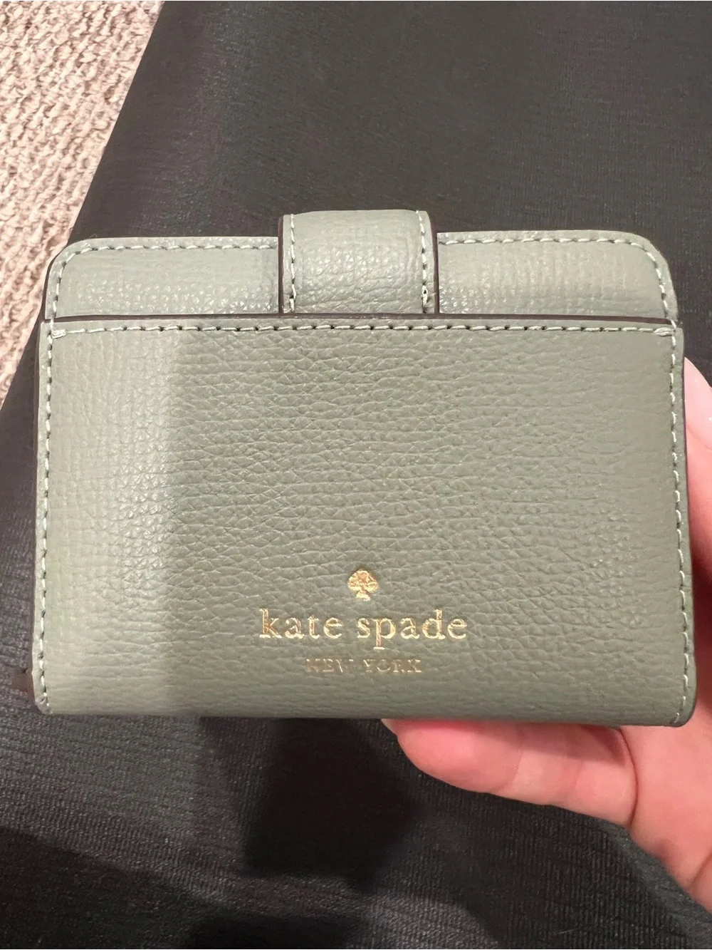 kate spade light sage pebbled leather wallet with gold clasp